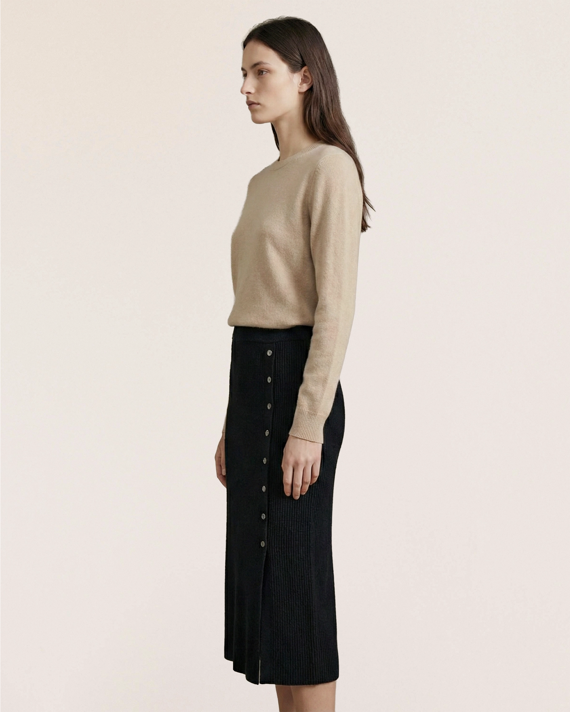 VIONIS-XY-lookbook-model-wearing-100-percent-inner-mongolian-cashmere-black-midi-skirt-side-view