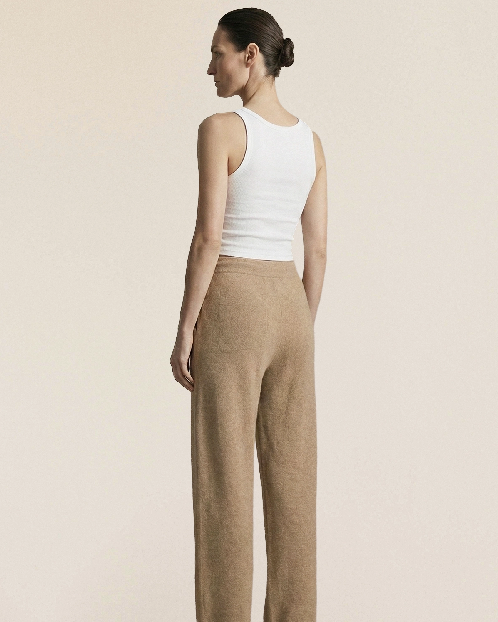 Vionis·XY back view of oatmeal Inner Mongolia cashmere trousers, relaxed wide-leg cut with durable shape retention
