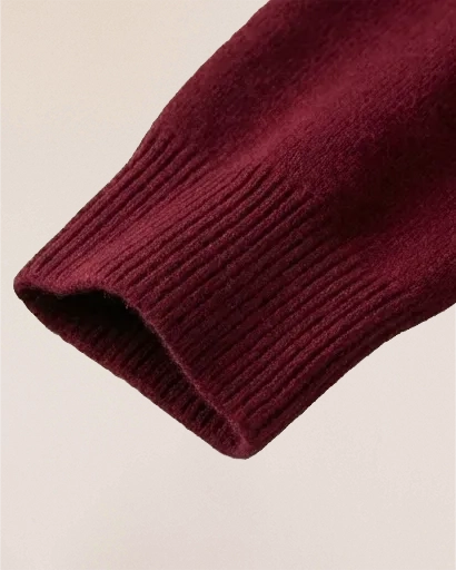 Ribbed cuff detail of VIONIS·XY 100% Inner Mongolia Cashmere sweater in Bordeaux