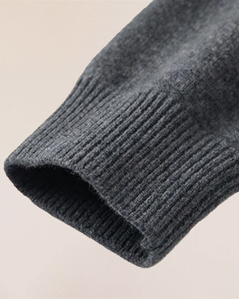 Ribbed cuff detail of VIONIS·XY 280g 100% Inner Mongolia Cashmere sweater in Charcoal Grey