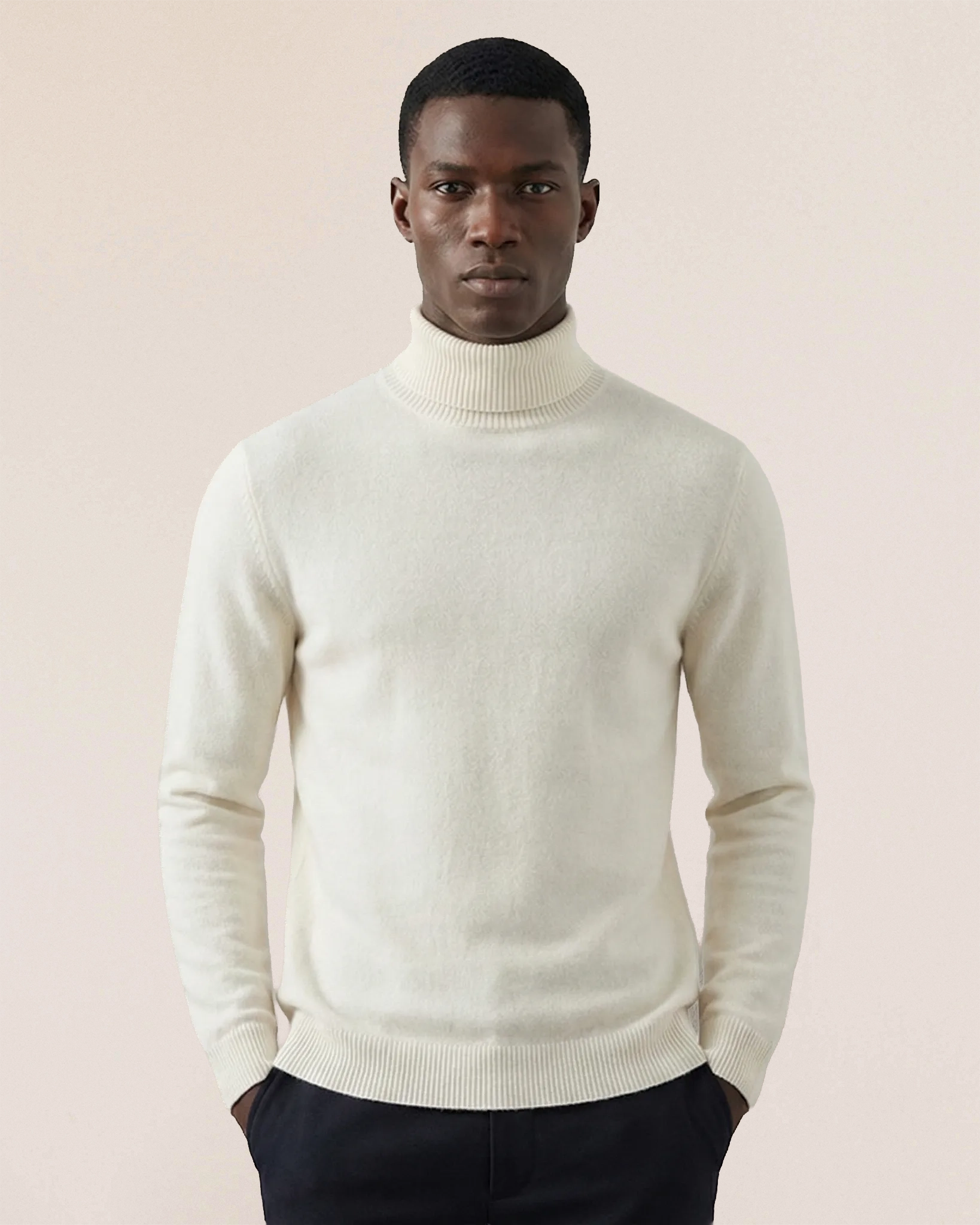 Side view of VIONIS·XY 100% Inner Mongolia Cashmere turtleneck in Soft Ivory showing tailored silhouette