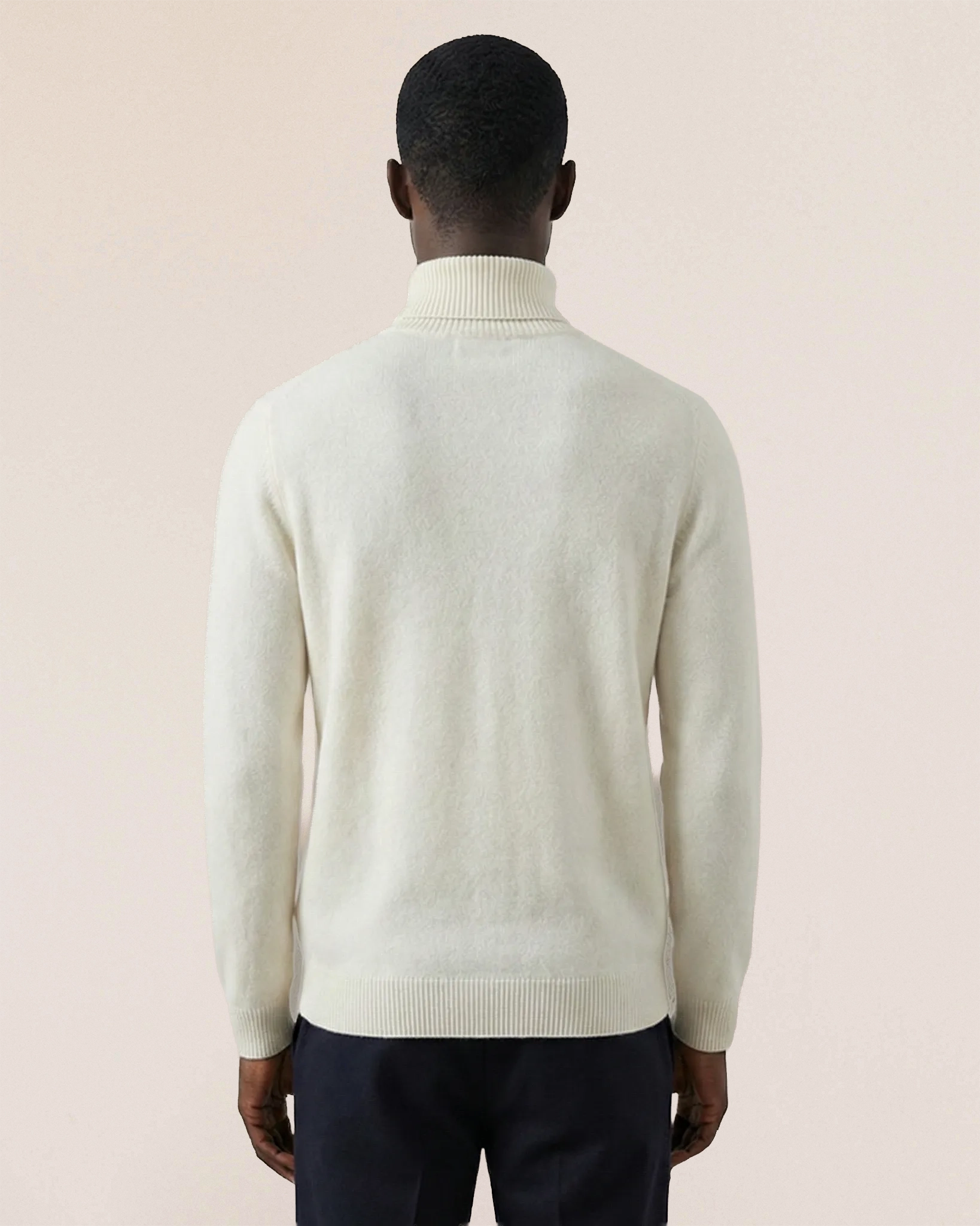 Back view of VIONIS·XY 100% Inner Mongolia Cashmere sweater in Soft Ivory, clean structured drape