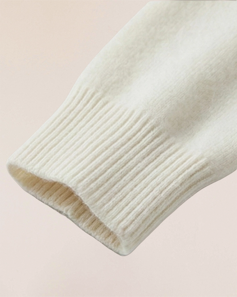 Ribbed cuff detail of VIONIS·XY 280g 100% Inner Mongolia Cashmere sweater in Soft Ivory
