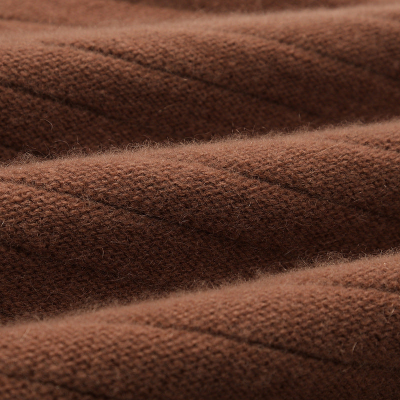 Macro view of VIONIS·XY classic camel cashmere knit, premium Inner Mongolian fibers with refined density and breathability
