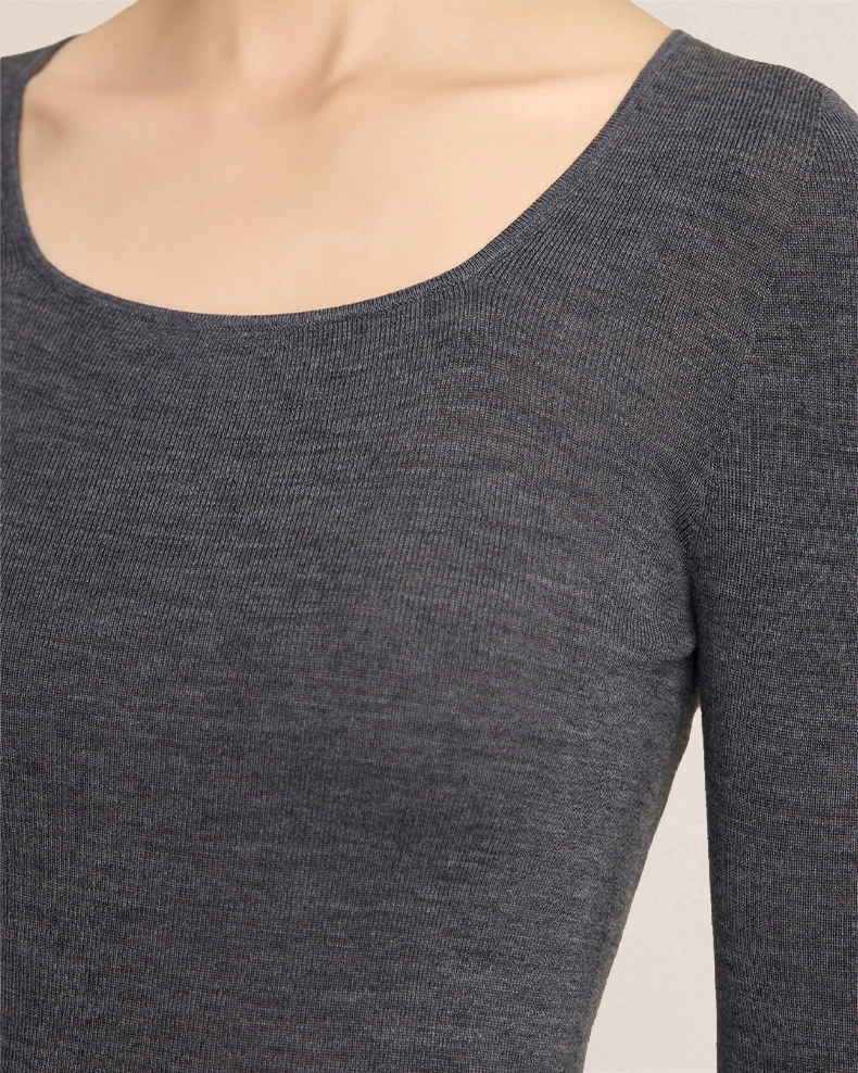 Close-up of VIONIS·XY charcoal grey merino wool texture, ultra-fine fibers with soft hand feel