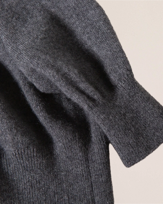 Sleeve cuff detail of VIONIS·XY charcoal grey cashmere cardigan