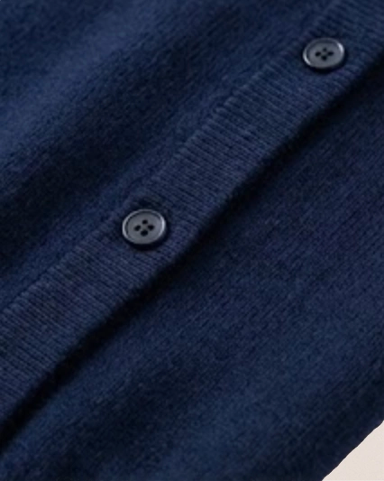 Detail of VIONIS·XY slate blue cardigan collar and front edge